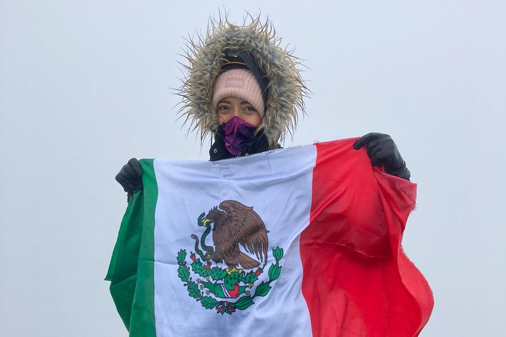 Bundled up against the summit wind
